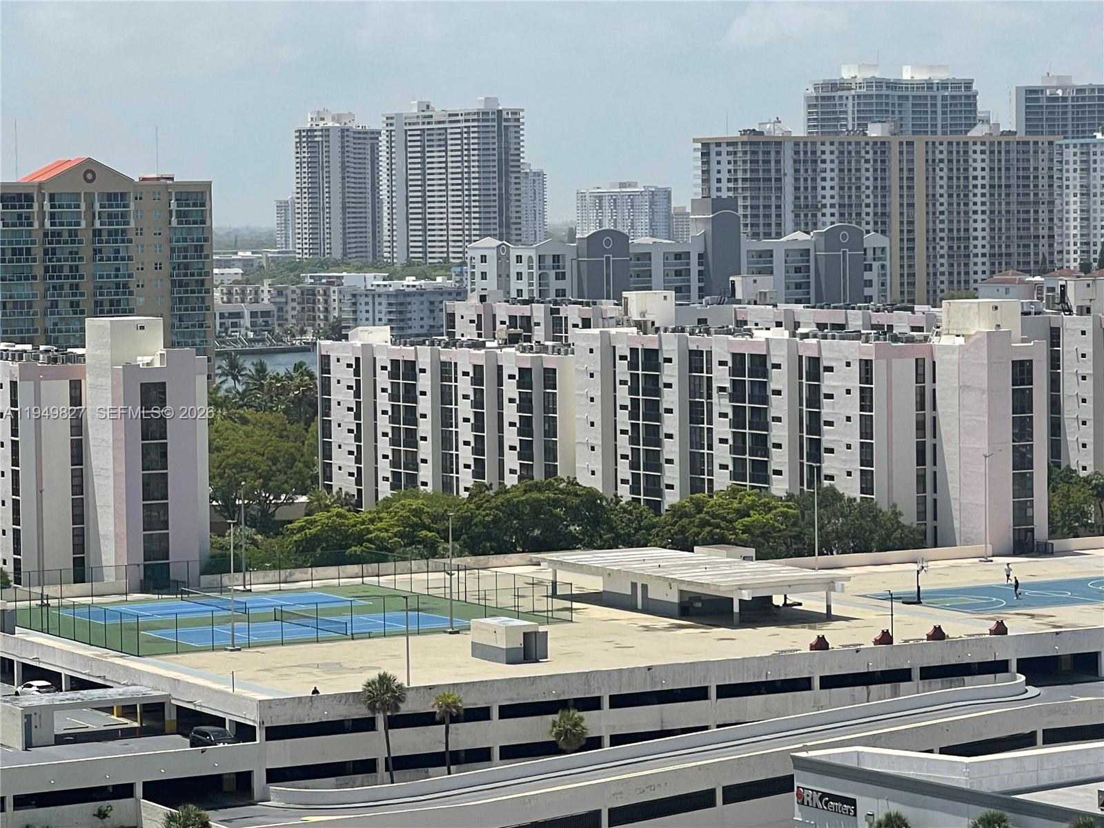 a view of city with tall buildings