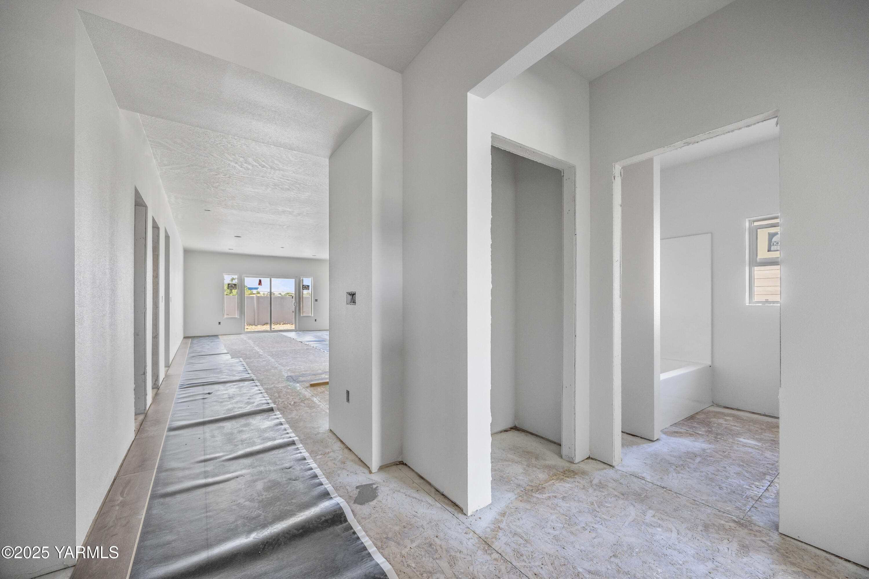 235 Shrute Road Prosser, WA 99350 - Photo 2 of 15 a view of a hallway view with wooden floor and staircase