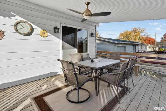 a view of a dining room with furniture wooden floor and a table