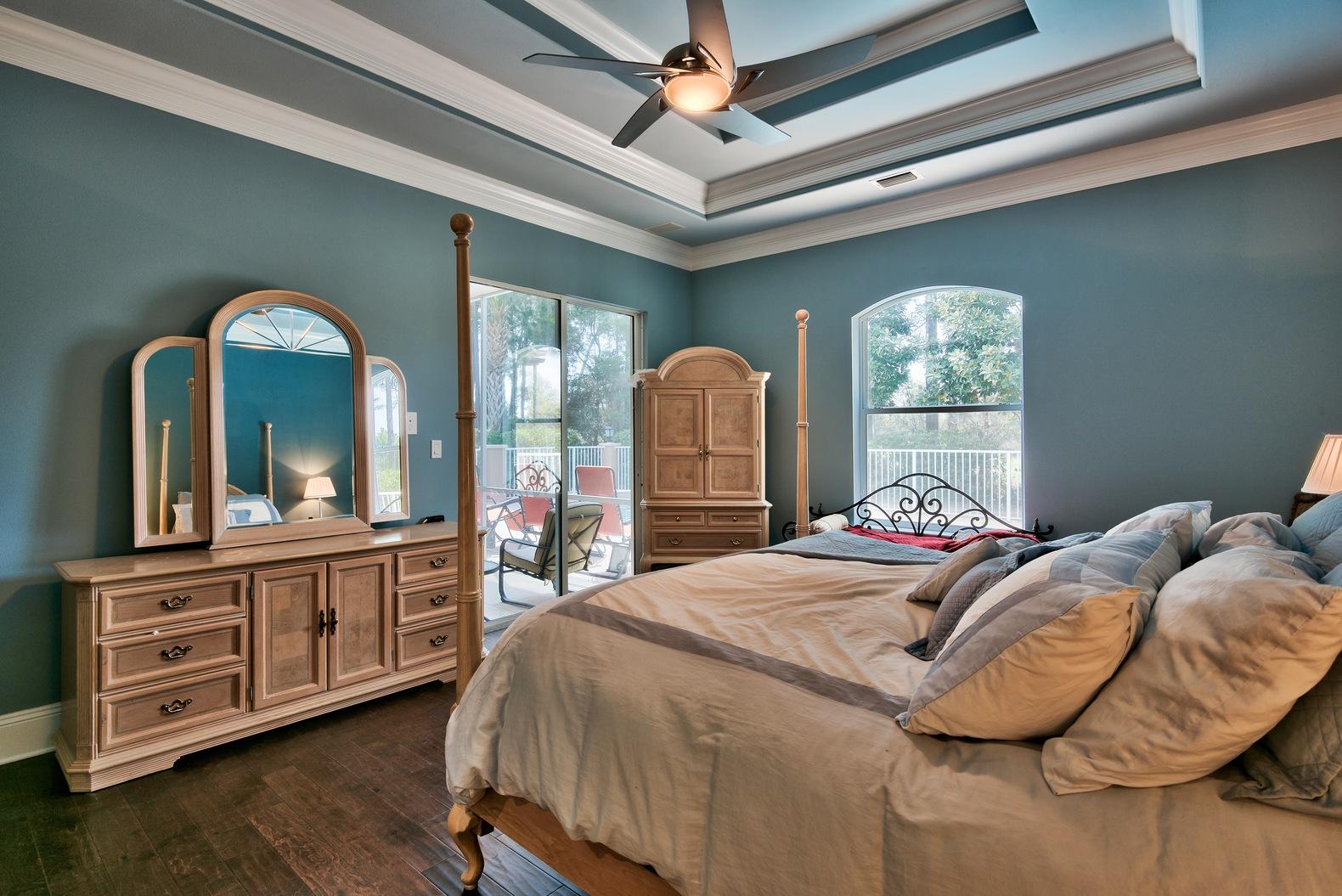 294 Ketch Court Destin, FL 32541 - Photo 16 of 30 a bedroom with a bed a dresser and window