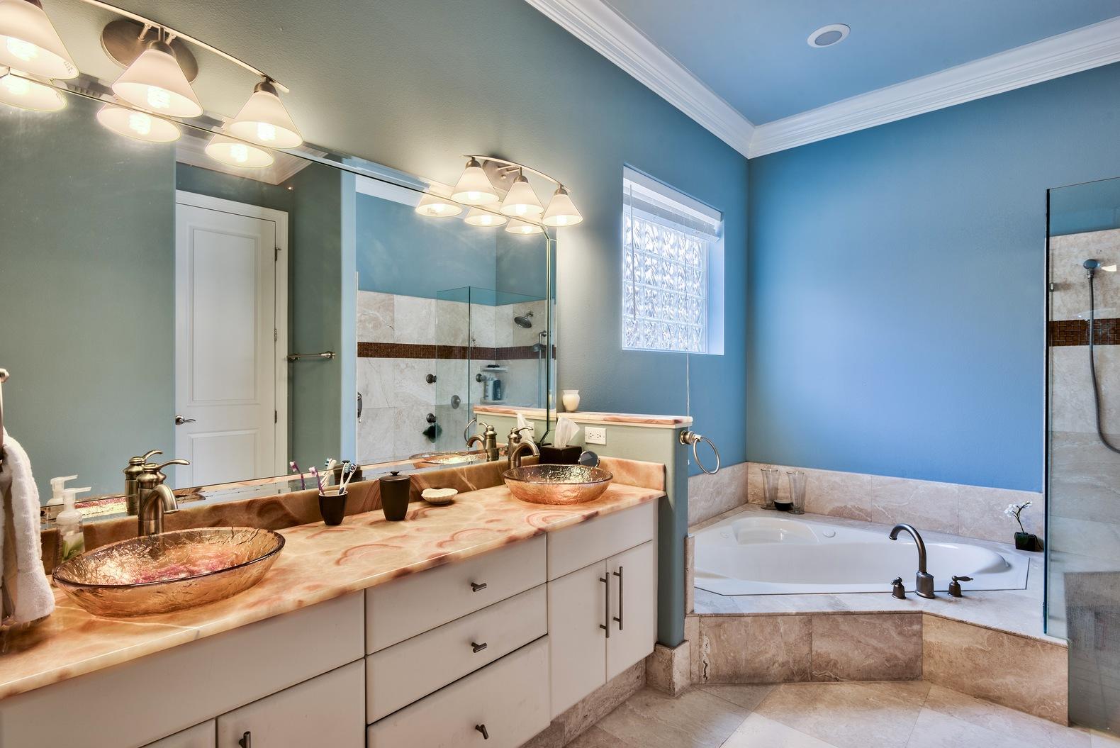 294 Ketch Court Destin, FL 32541 - Photo 17 of 30 a bathroom with a tub sink and mirror