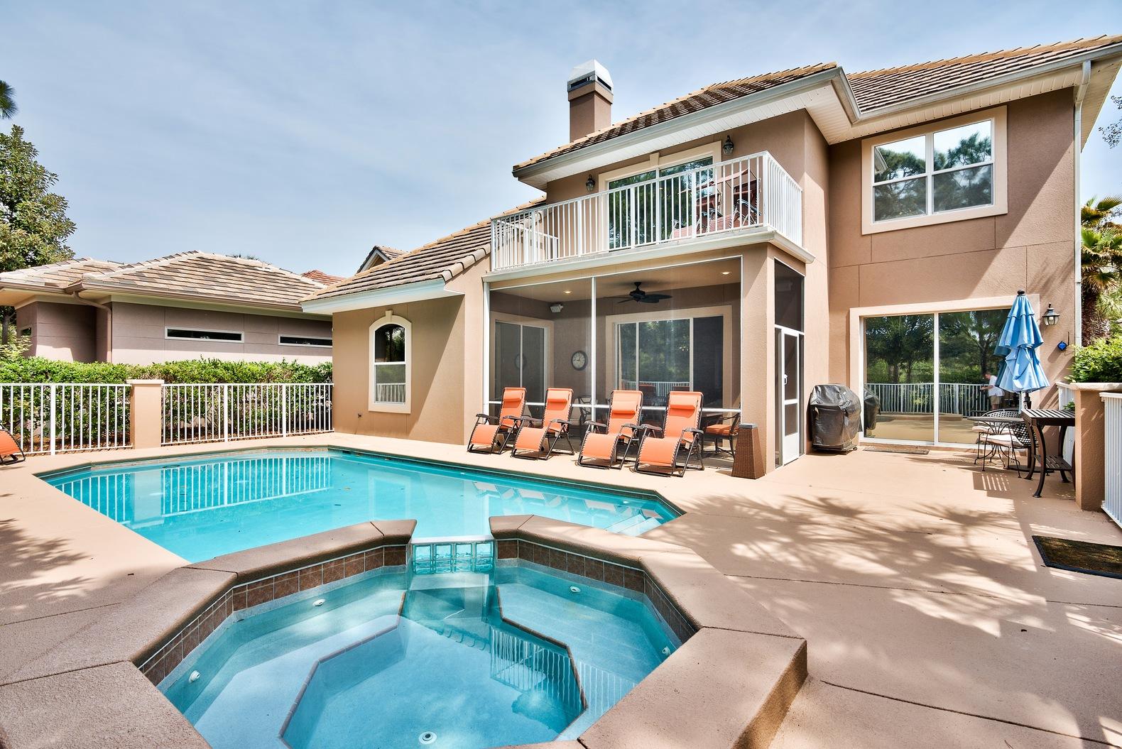 294 Ketch Court Destin, FL 32541 - Photo 28 of 30 a view of a building with a swimming pool and furniture