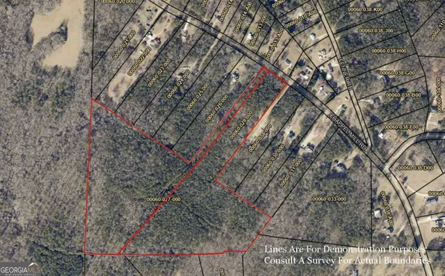 a backyard of a building with large trees