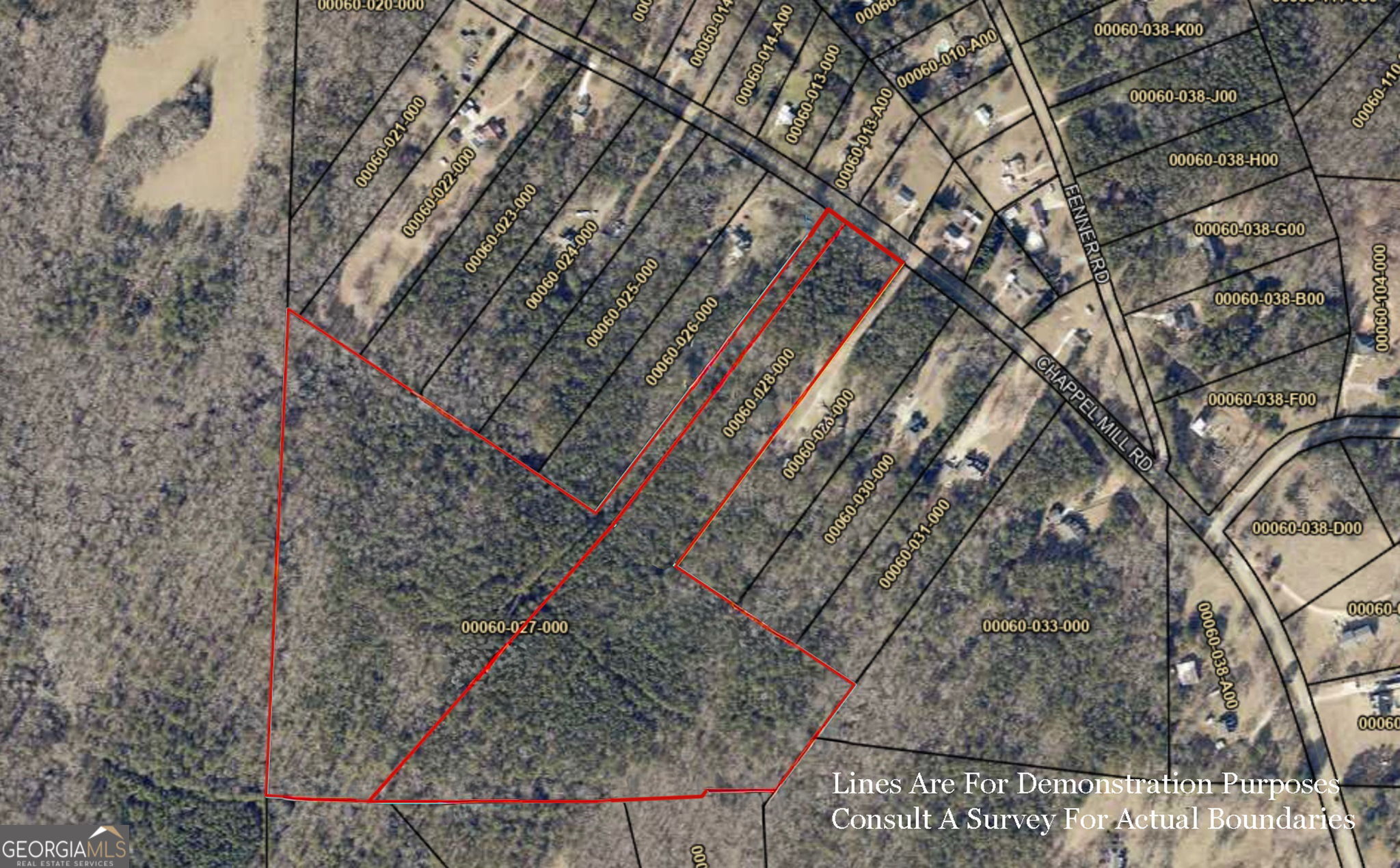 a backyard of a building with large trees