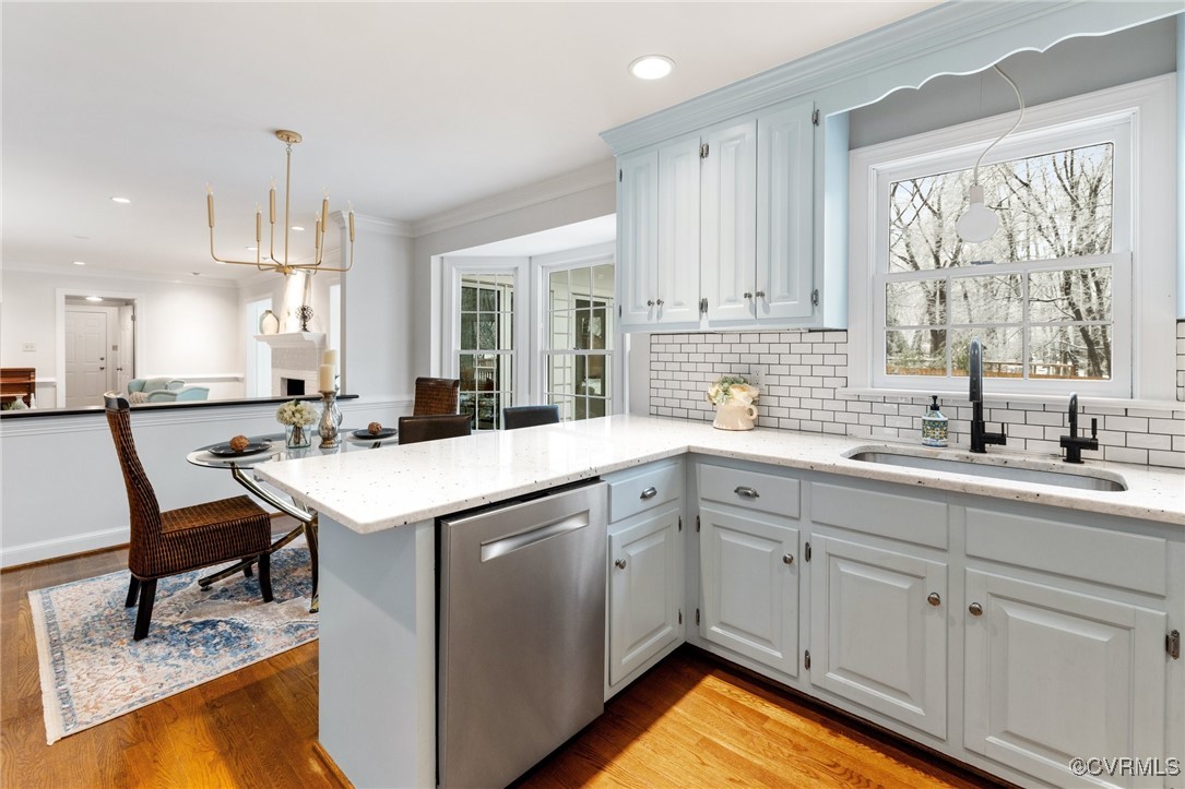 2561 Castle Hill Road Midlothian, VA 23113 - Photo 13 of 46 a kitchen with a sink window and cabinets