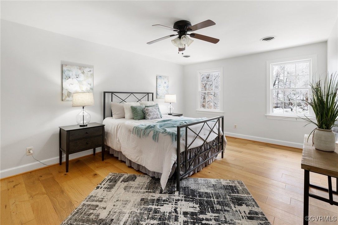 2561 Castle Hill Road Midlothian, VA 23113 - Photo 16 of 46 Bedroom featuring ceiling fan and light wood-type