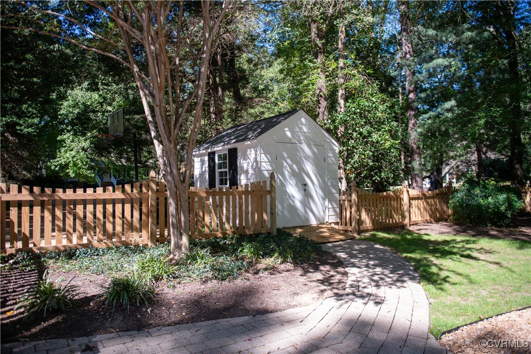 2561 Castle Hill Road Midlothian, VA 23113 - Photo 24 of 46 View of yard featuring a storage shed