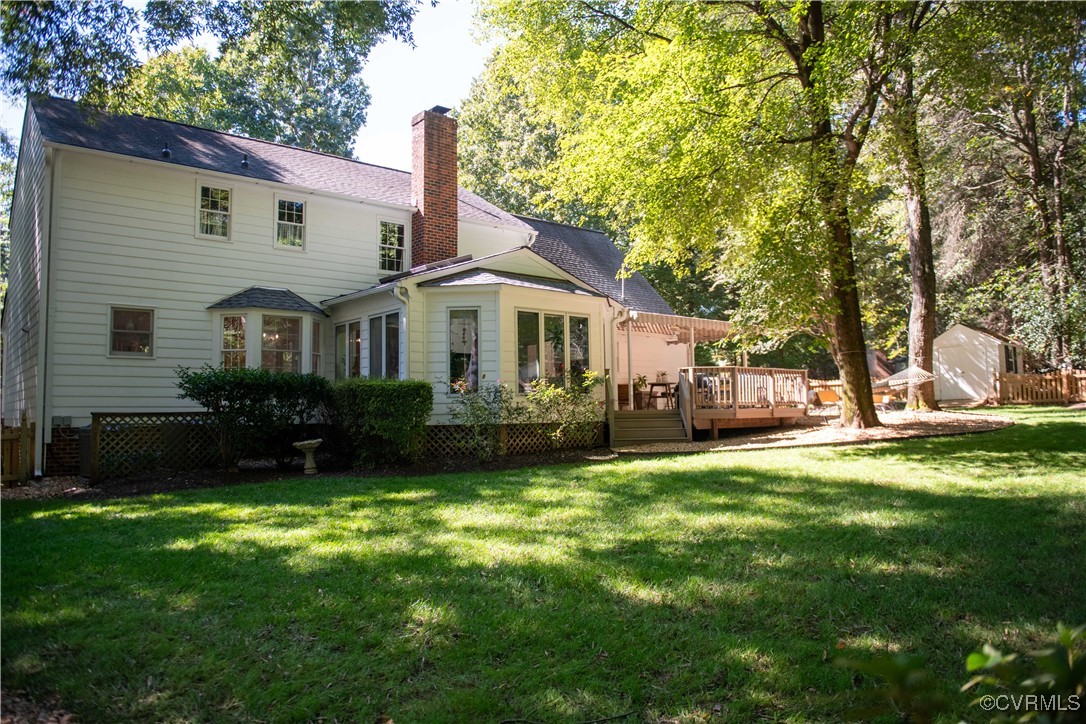 2561 Castle Hill Road Midlothian, VA 23113 - Photo 26 of 46 a view of a house with a yard deck and a large tree