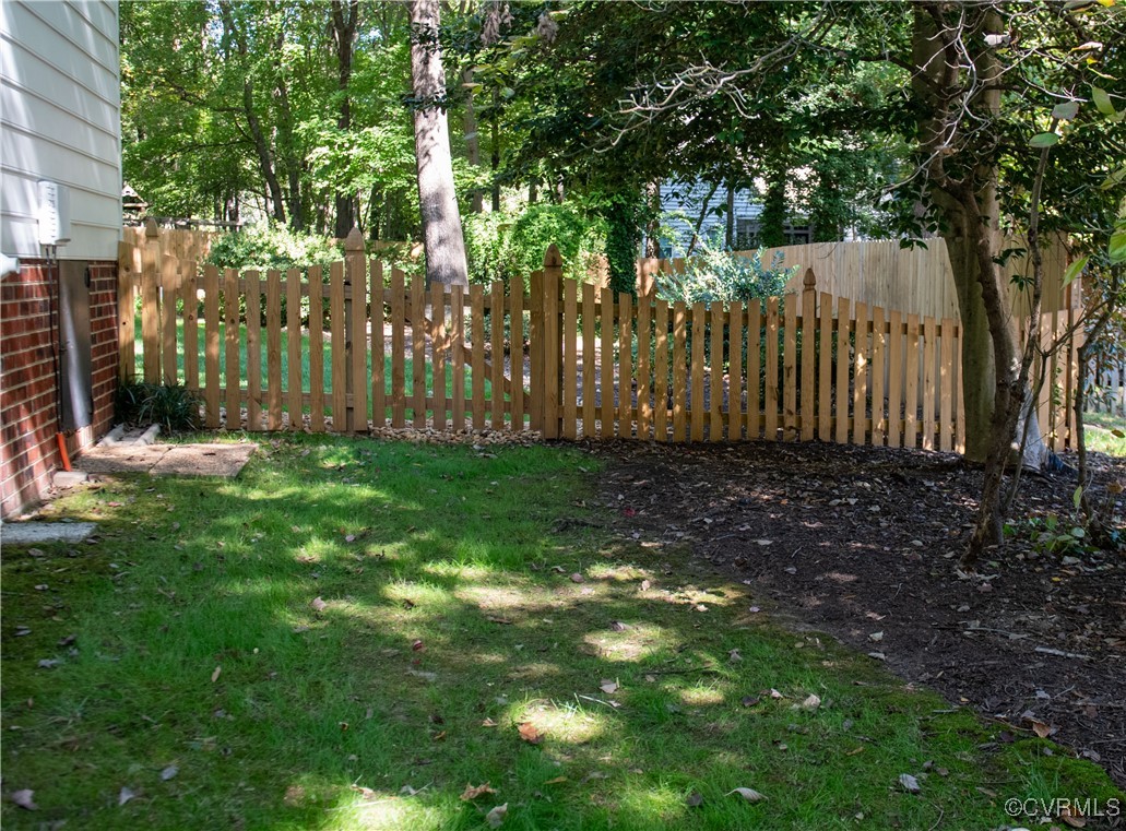 2561 Castle Hill Road Midlothian, VA 23113 - Photo 36 of 46 a view of a yard with large trees