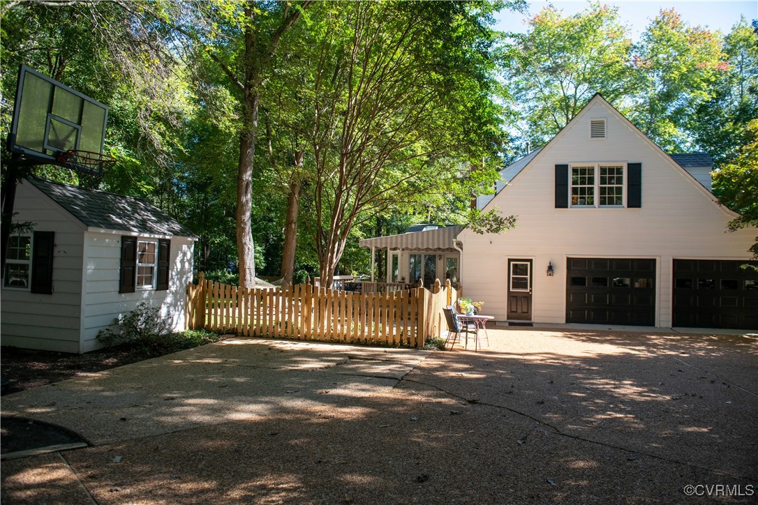 2561 Castle Hill Road Midlothian, VA 23113 - Photo 40 of 46 a front view of a house with a garage