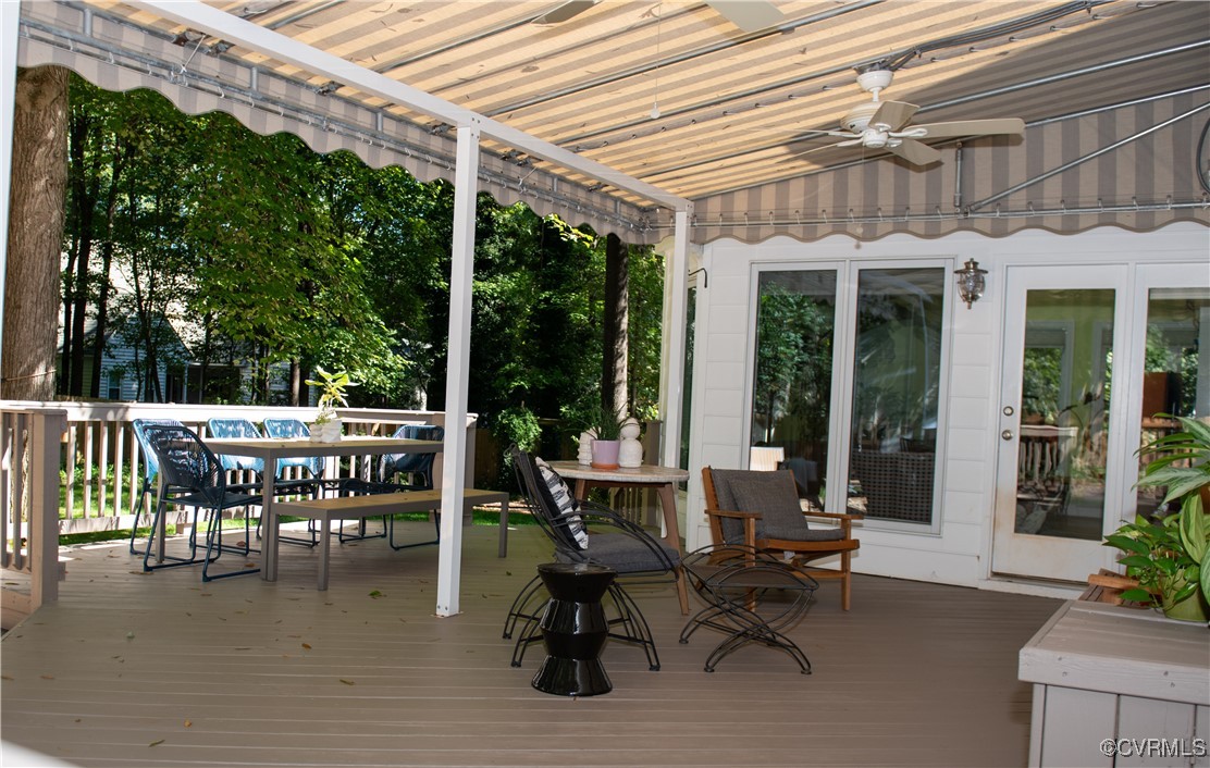 2561 Castle Hill Road Midlothian, VA 23113 - Photo 41 of 46 a patio with glass top table and chairs