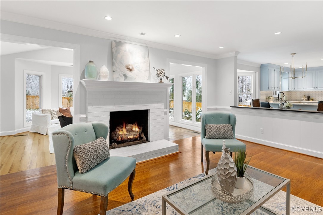 2561 Castle Hill Road Midlothian, VA 23113 - Photo 6 of 46 a living room with furniture and a fireplace