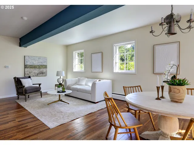 a living room with furniture and a table