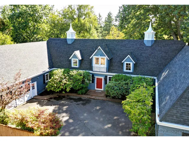an aerial view of residential house with outdoor space
