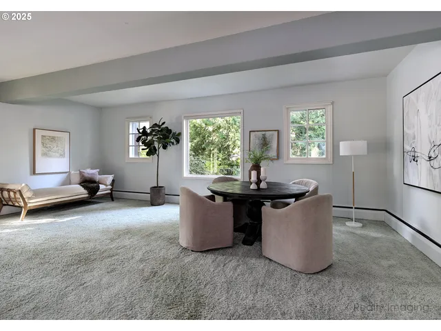 a view of kitchen with granite countertop lots of counter top space
