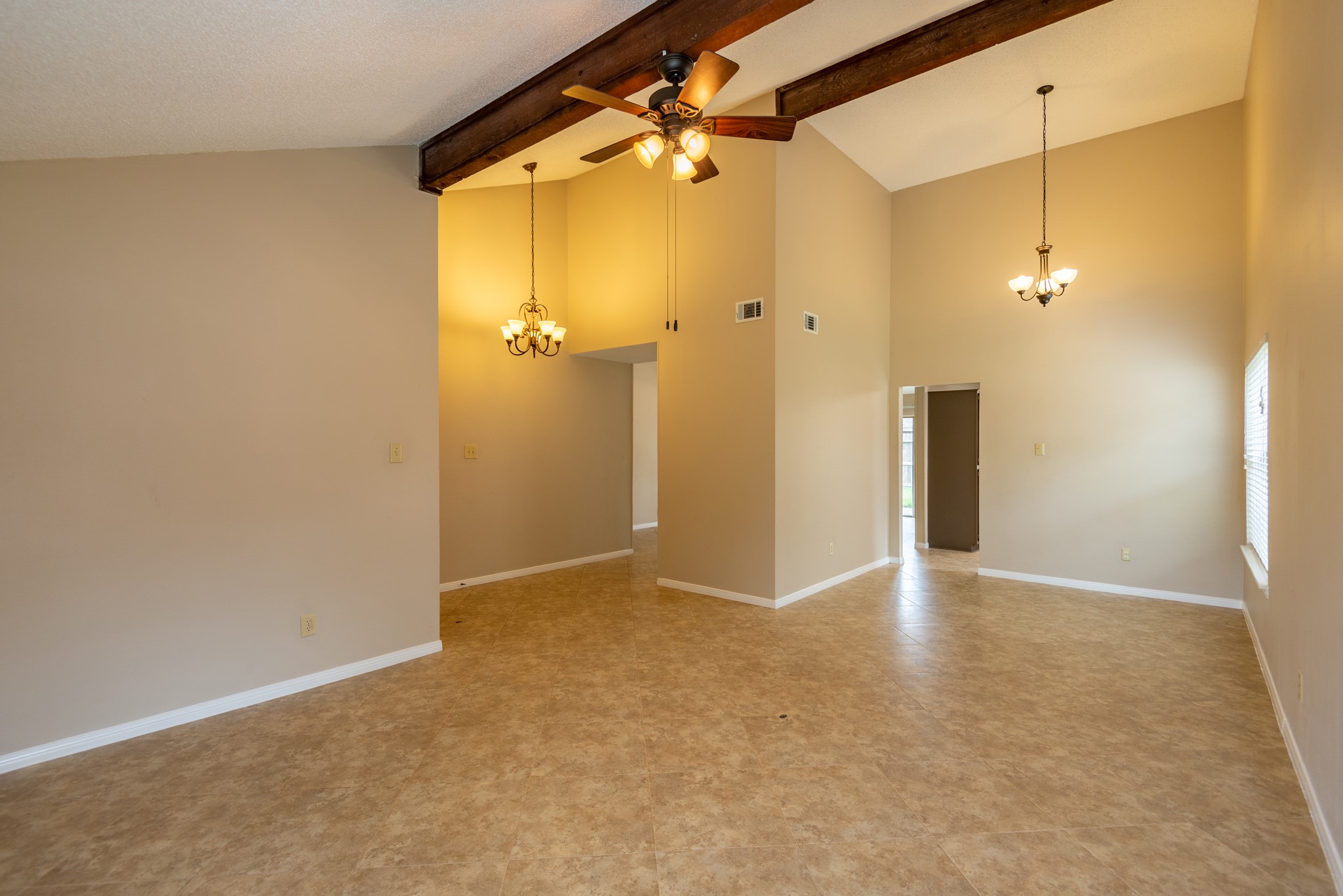12034 Paddock Way Houston, TX 77065 - Photo 2 of 19 This home features high ceilings, no carpet, and a single story.