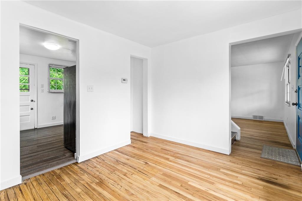 156 Lebeau Pittsburgh, PA 15221 - Photo 14 of 40 a view of empty room with wooden floor