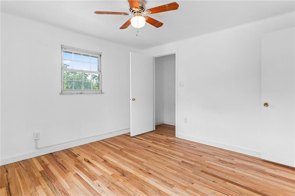 156 Lebeau Pittsburgh, PA 15221 - Photo 19 of 40 a view of a room with wooden floor and ceiling fan