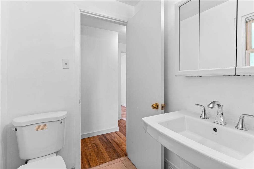 156 Lebeau Pittsburgh, PA 15221 - Photo 22 of 40 a bathroom with a sink toilet and vanity