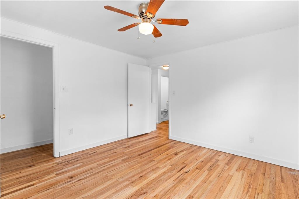 156 Lebeau Pittsburgh, PA 15221 - Photo 24 of 40 a view of empty room with wooden floor