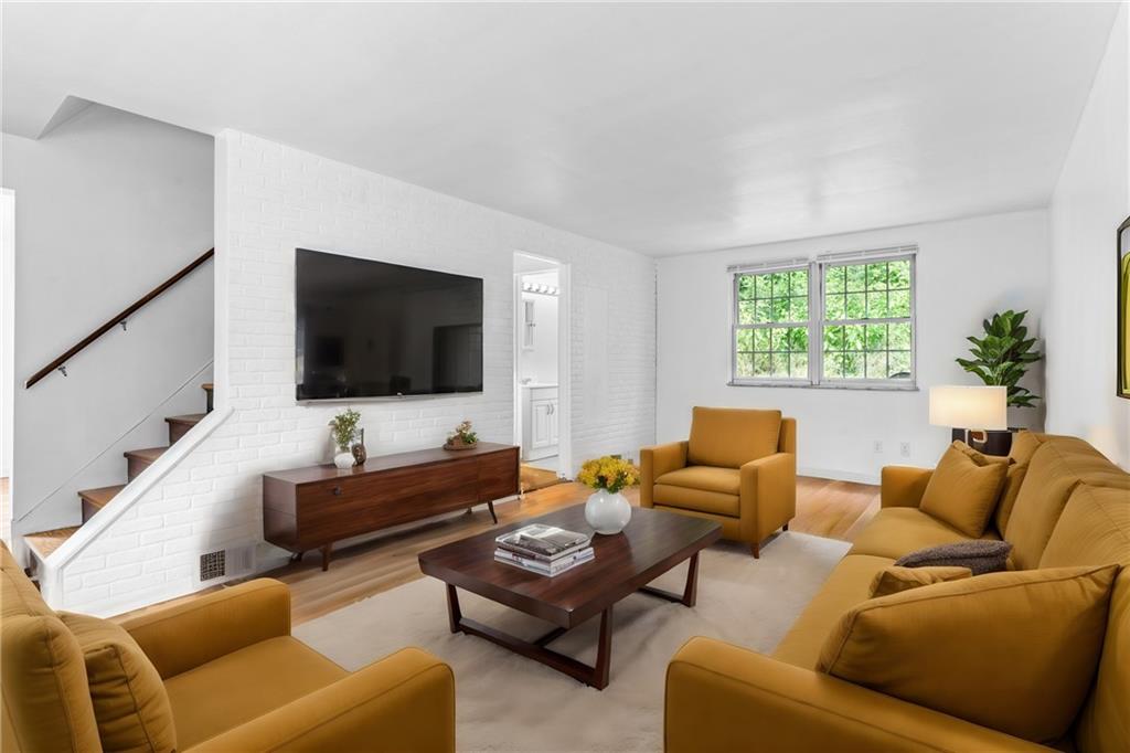 156 Lebeau Pittsburgh, PA 15221 - Photo 3 of 40 a living room with furniture and a flat screen tv