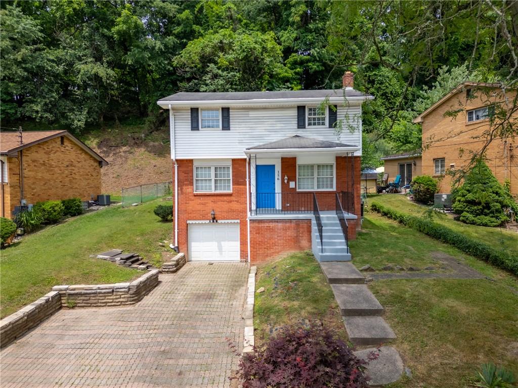 156 Lebeau Pittsburgh, PA 15221 - Photo 35 of 40 front view of a house with a yard