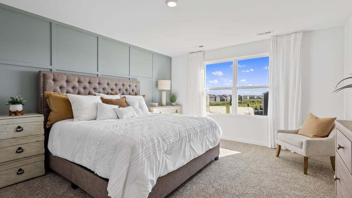 7653 West 106th Place Crown Point, IN 46307 - Photo 15 of 55 a bedroom with a bed and window