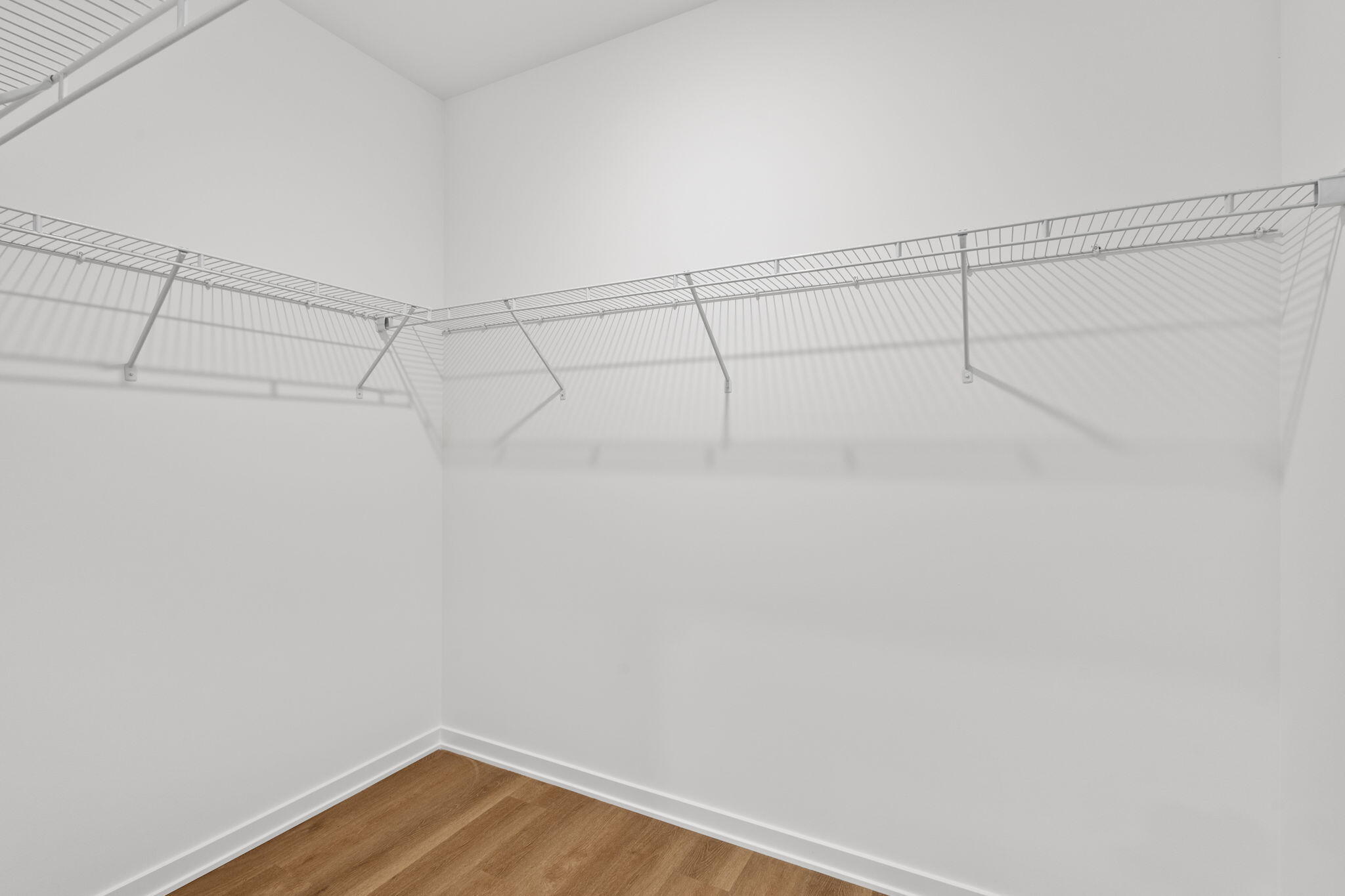 7653 West 106th Place Crown Point, IN 46307 - Photo 40 of 55 a view of a room with racks on the wall