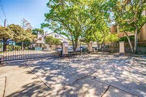 5550 Spring Valley Road, Unit E23 Dallas, TX 75254 - Photo 18 of 19 Gated access.