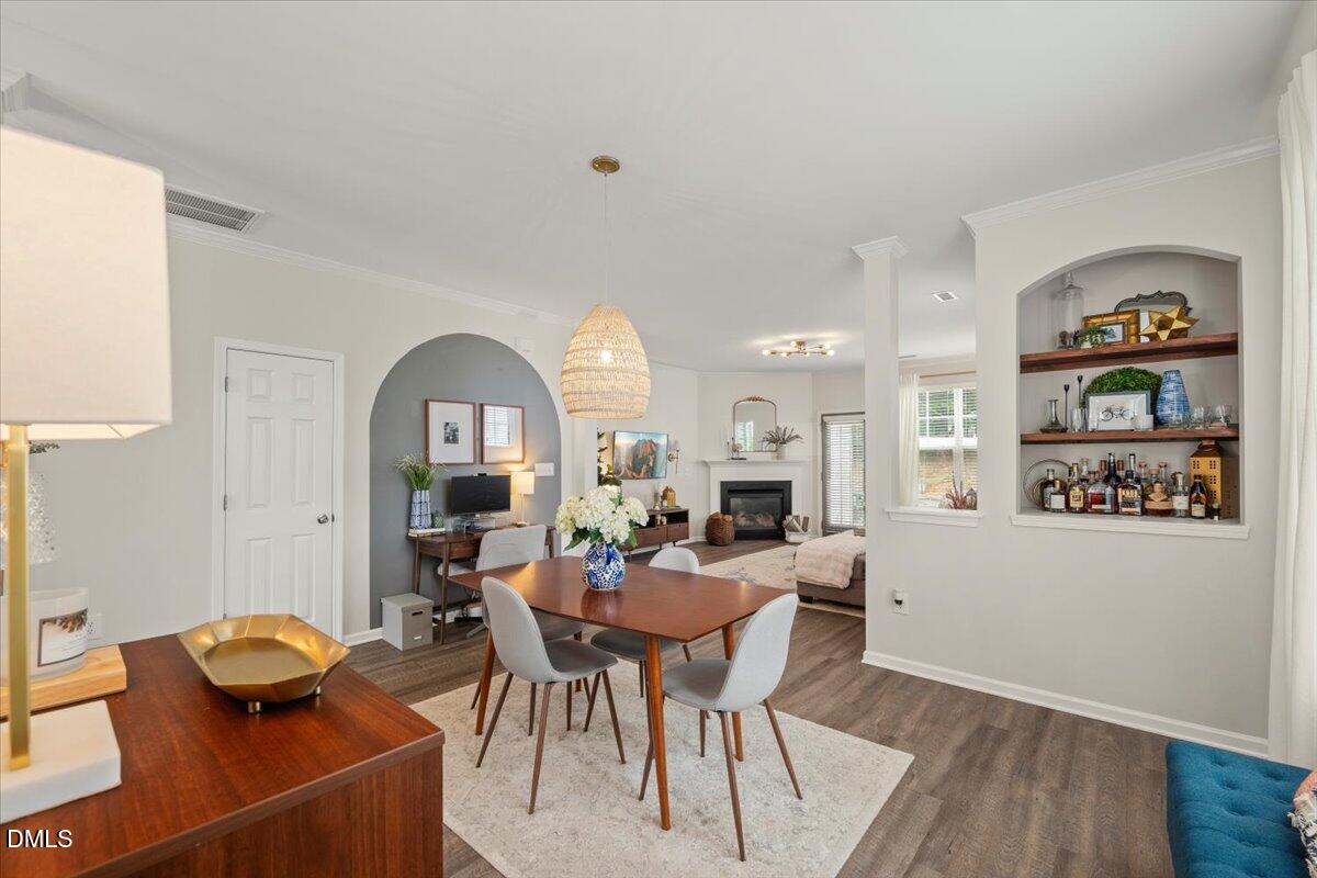 8449 Central Drive Raleigh, NC 27613 - Photo 5 of 38 a view of a dining room with furniture