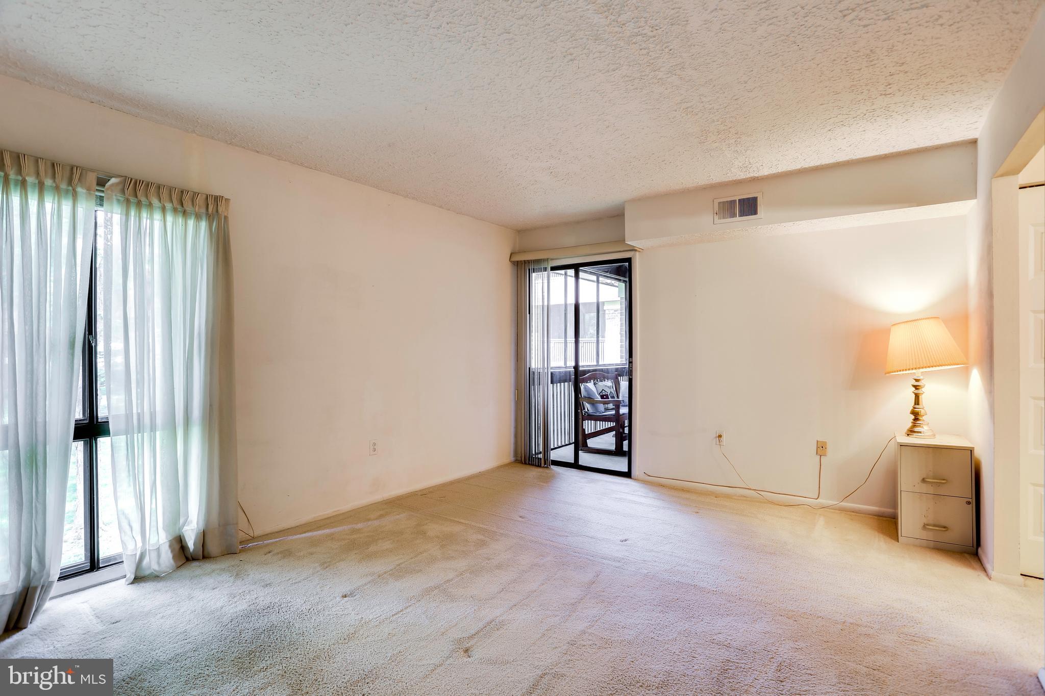 5249 West Running Brook Road, Unit 201 Columbia, MD 21044 - Photo 17 of 32 LARGE MASTER BEDROOM WITH BALCONY ACCESS