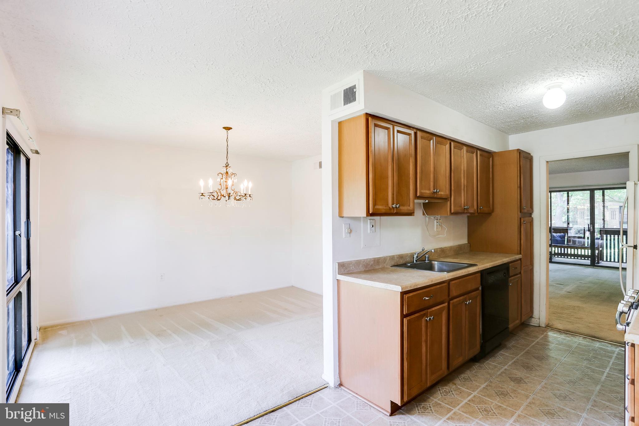 5249 West Running Brook Road, Unit 201 Columbia, MD 21044 - Photo 10 of 32 LEADS TO DINING ROOM