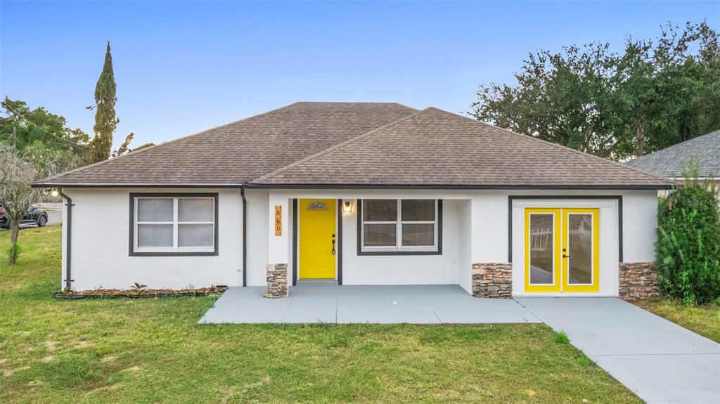 860 South Grove Street Eustis, FL 32726 - Photo 4 of 54 a view of a house with a swimming pool