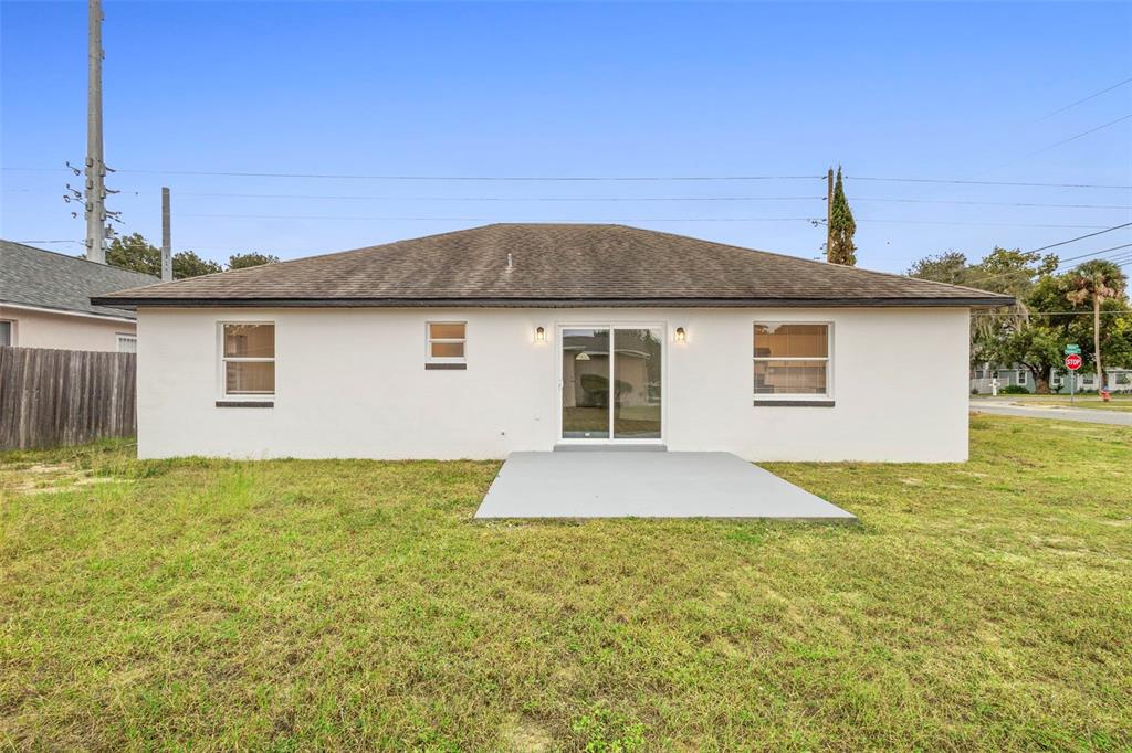 860 South Grove Street Eustis, FL 32726 - Photo 7 of 54 a house view with a garden space