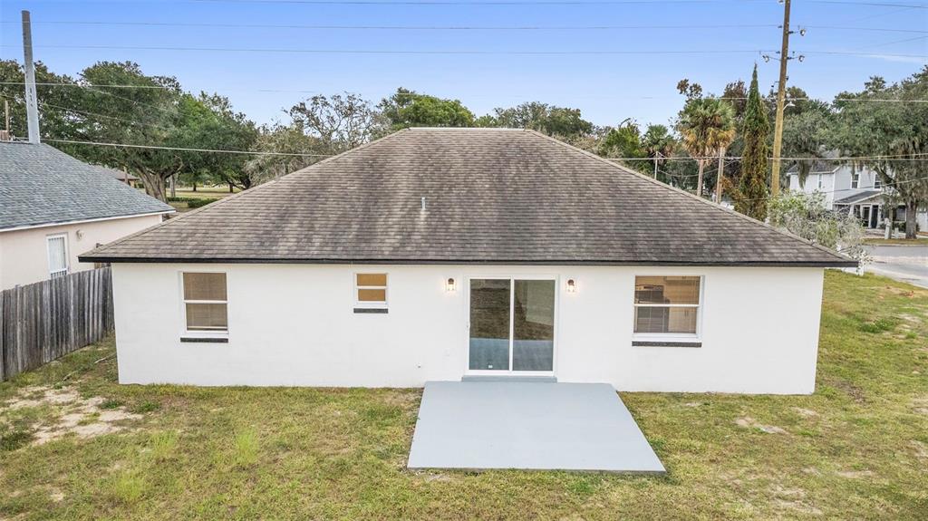 860 South Grove Street Eustis, FL 32726 - Photo 8 of 54 a house view with a garden space