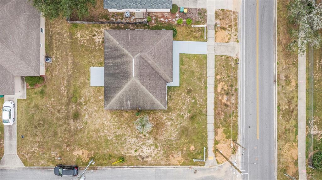 860 South Grove Street Eustis, FL 32726 - Photo 10 of 54 a bathroom with a shower