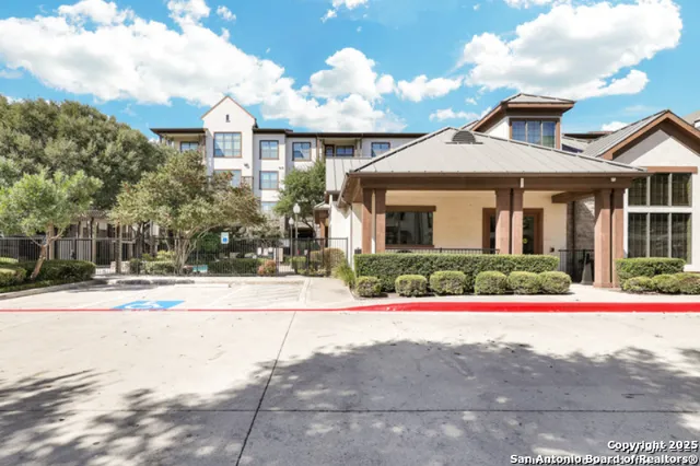 a view of white house with a yard