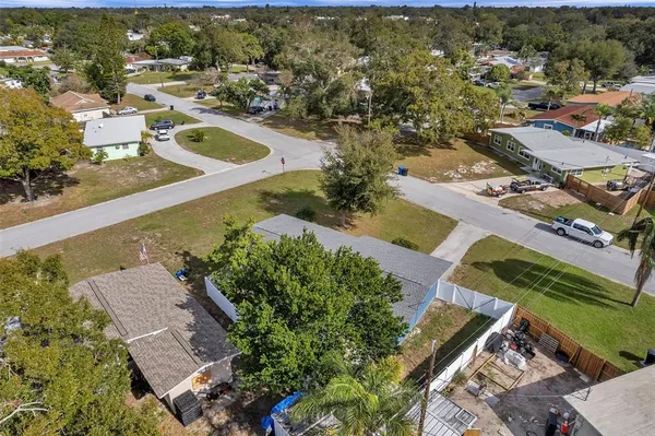 an aerial view of residential house with outdoor space