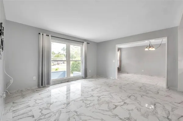 a kitchen with stainless steel appliances granite countertop a refrigerator sink and cabinets