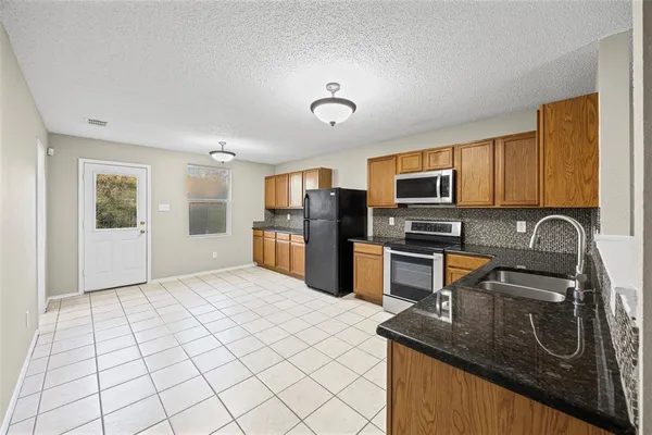 $2,394 | 8409 Redheart Street, Arlington, TX 76002