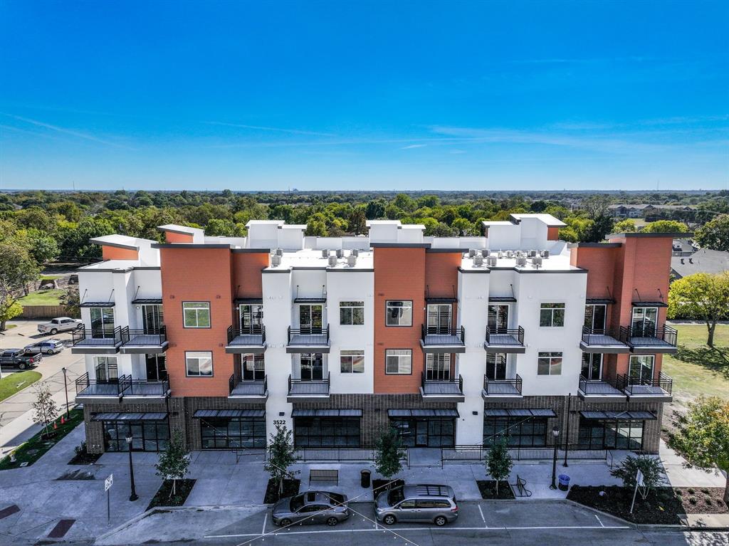 3522 Main Street, Unit 203 Rowlett, TX 75088 - Photo 1 of 20 an aerial view of city with tall buildings