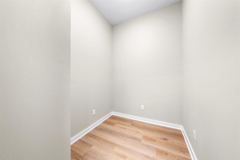 3522 Main Street, Unit 203 Rowlett, TX 75088 - Photo 17 of 20 a view of a small space with wooden floor