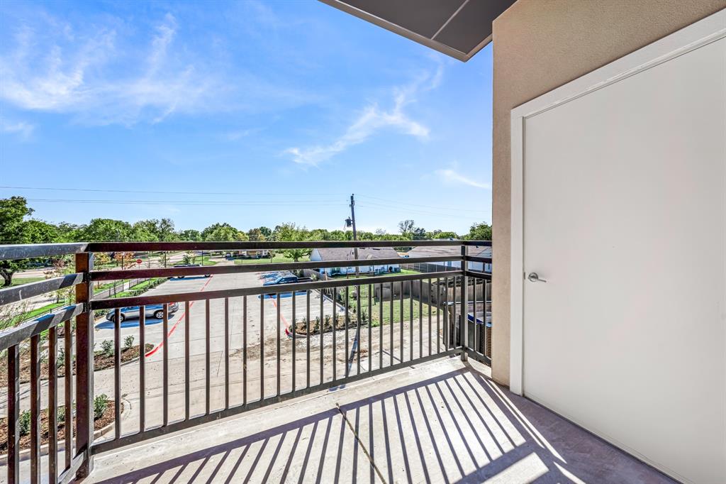 3522 Main Street, Unit 203 Rowlett, TX 75088 - Photo 19 of 20 a view of city from a balcony