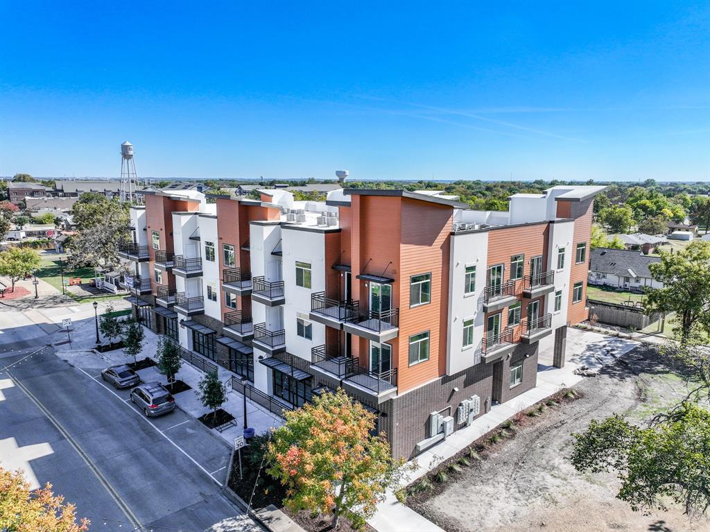 3522 Main Street, Unit 203 Rowlett, TX 75088 - Photo 20 of 20 a view of a buildings with a ocean view