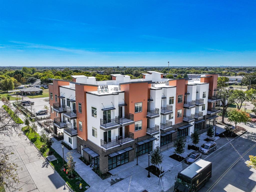 3522 Main Street, Unit 203 Rowlett, TX 75088 - Photo 2 of 20 a view of a buildings in the city