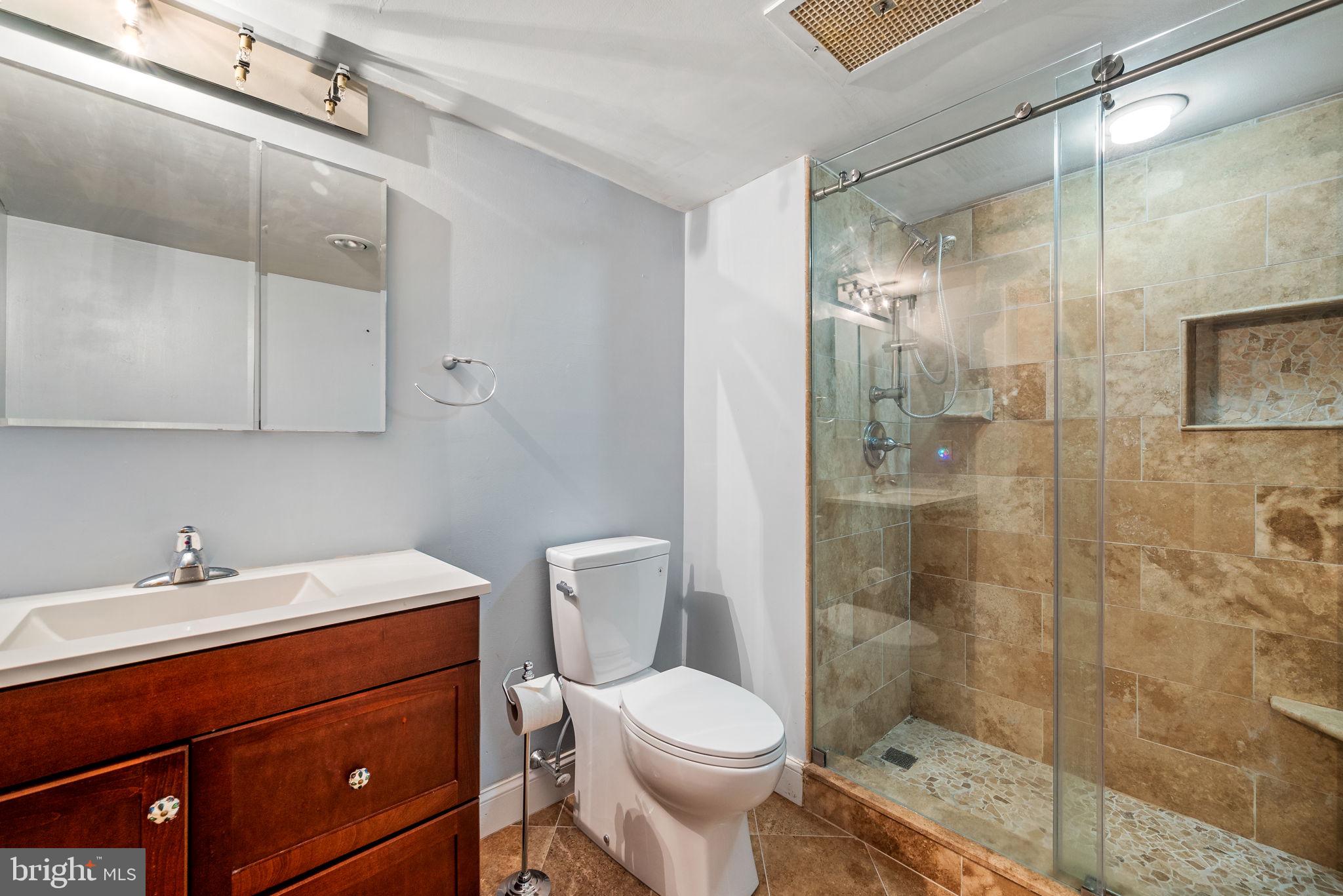 700 Avondale Road, Unit 3D Wallingford, PA 19086 - Photo 12 of 24 Renovated en suite bathroom with walk-in shower