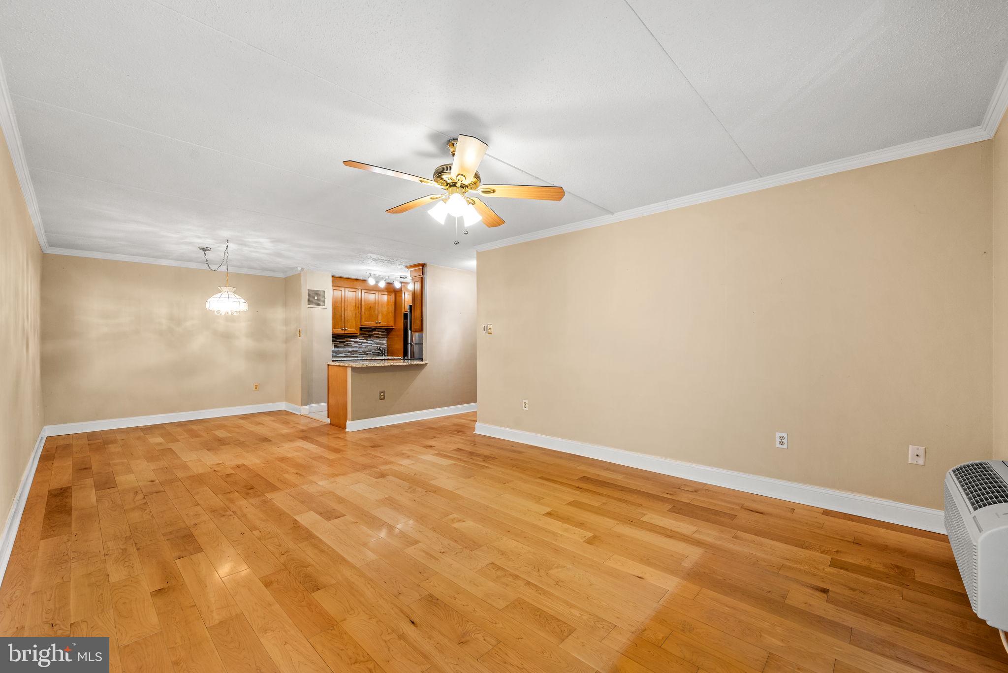 700 Avondale Road, Unit 3D Wallingford, PA 19086 - Photo 4 of 24 Living room and dining room w hardwood floors