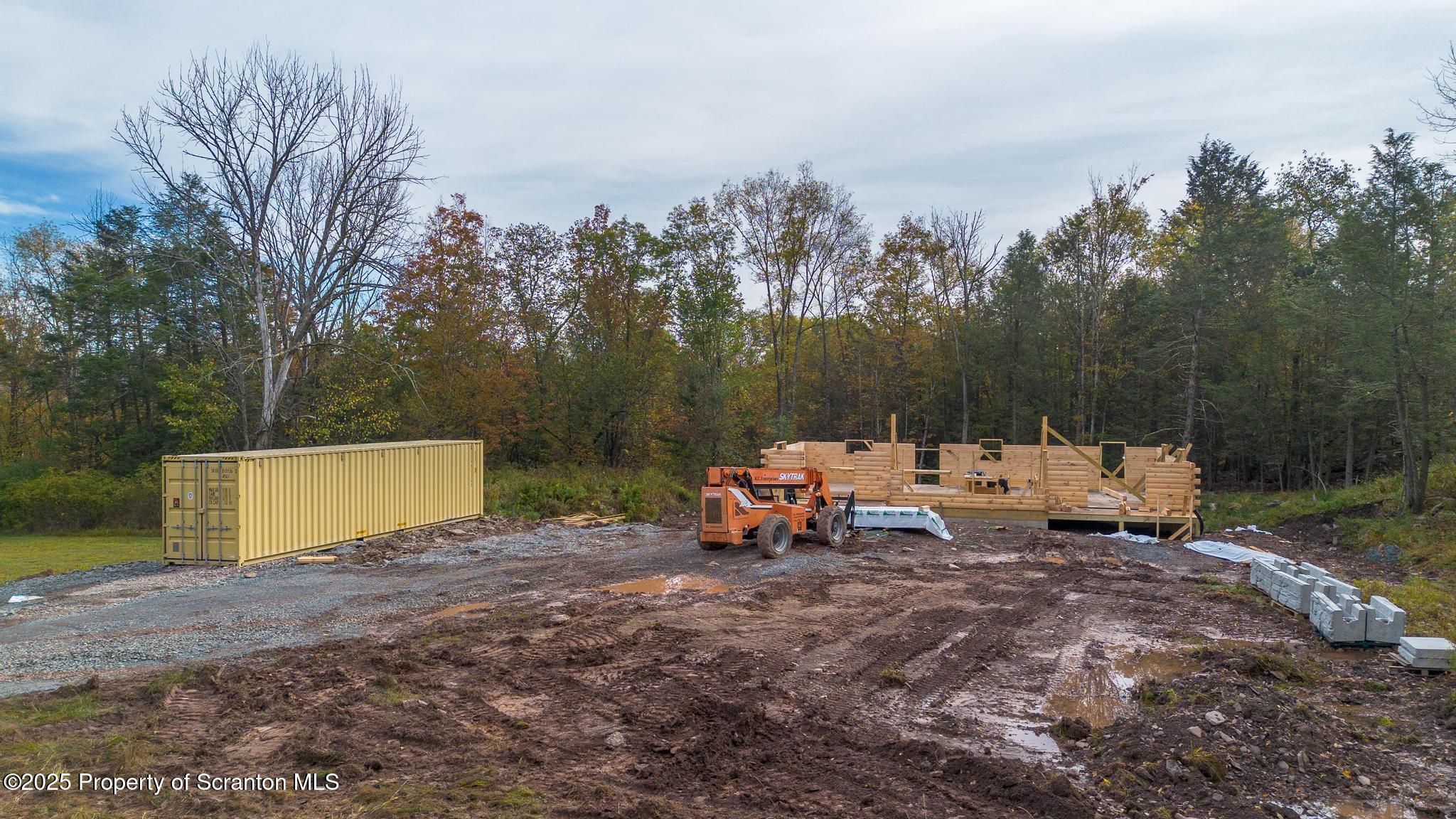 344 Burns Road Waymart, PA 18472 - Photo 13 of 19 a backyard of a house with table and chairs