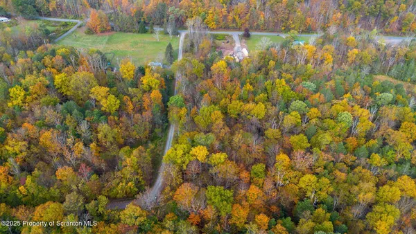 a view of a lake with mountains in the background