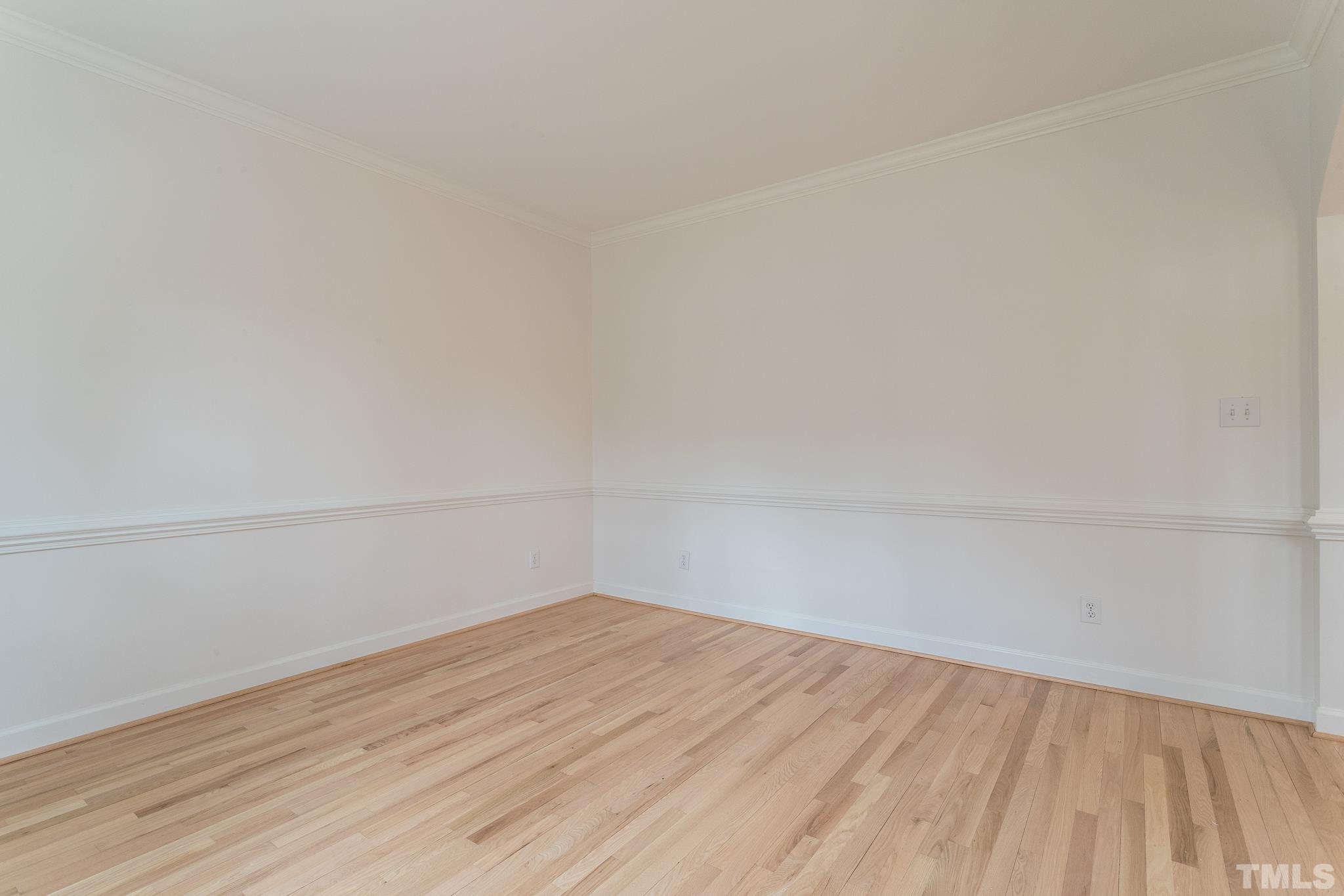 2308 Hideaway Court Raleigh, NC 27613 - Photo 24 of 43 a view of a room with wooden floor